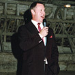 Harry Dolan singing in barn